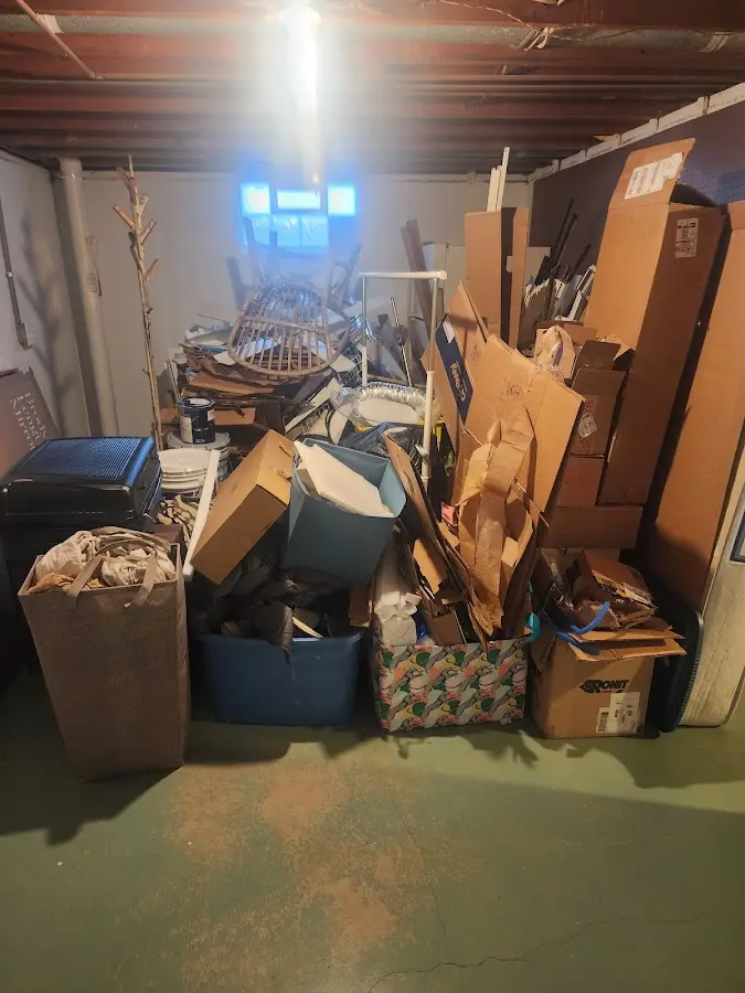 Roll-off dumpster container at job site for 6 Yard Dumpster Rental in North Kingstown